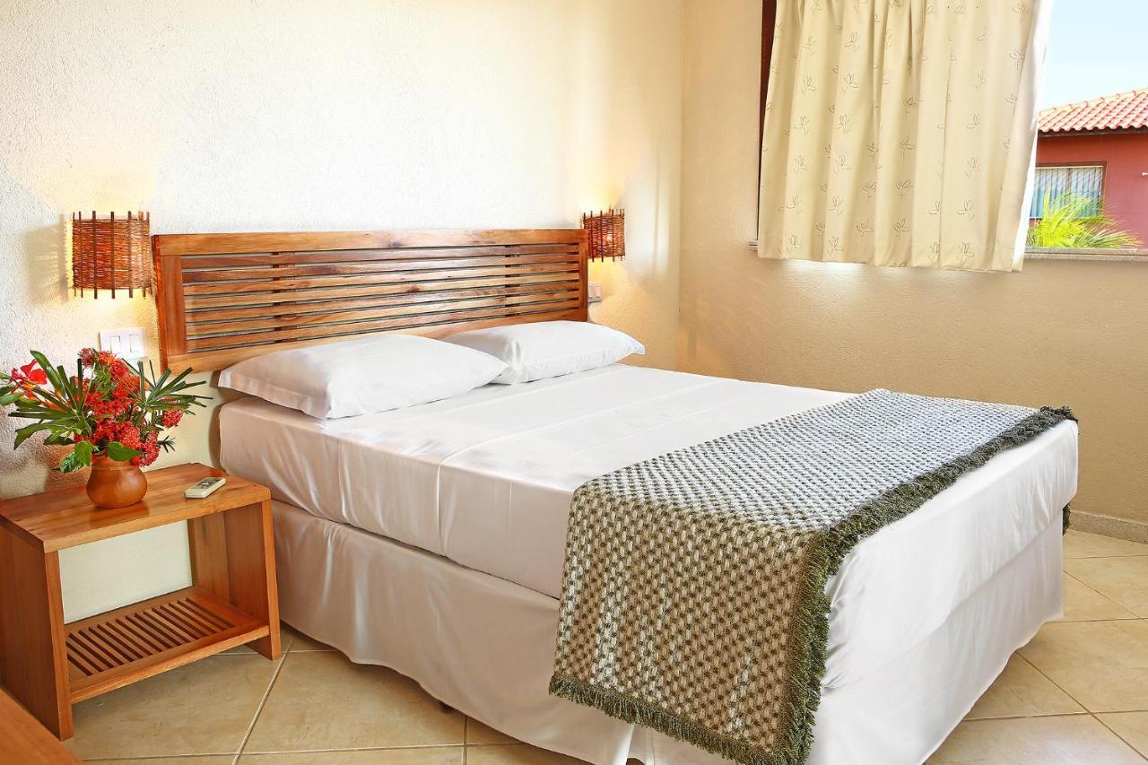 La Torre Resort All Inclusive Porto Seguro Bagian luar foto A bed with a bedsheet